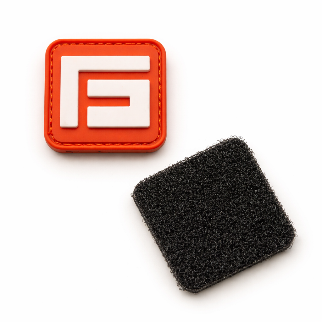 FirmGuards logo PVC patch with hook and loop backing on white background