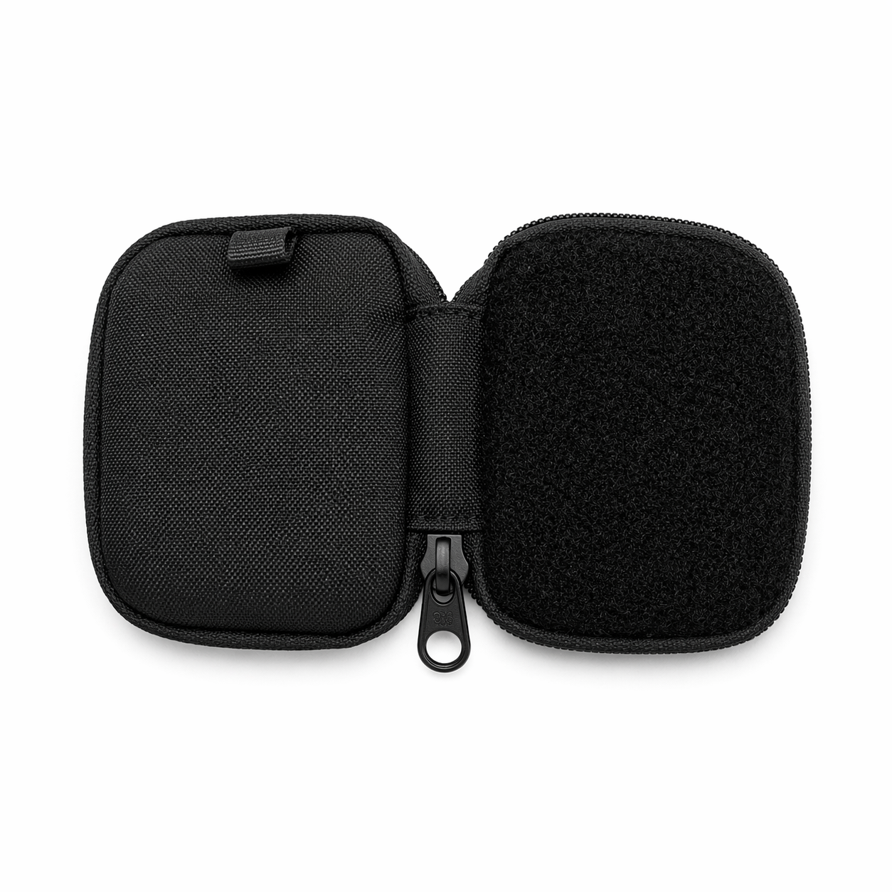 Open black micro EDC pouch with hook and loop panel on one side and Cordura fabric on the other, reverse coil zipper and compact design on white background by FirmGuards