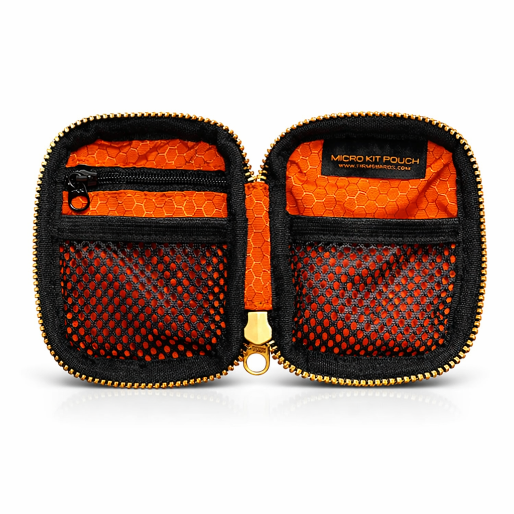 FirmGuards Micro Kit Pouch J Swag Black Cordura open showing orange interior mesh pockets and gold zipper everyday carry organizer